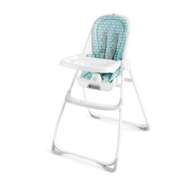 A baby high chair with a blue and white pattern.