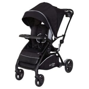 A black stroller with a seat and canopy.