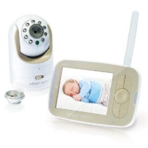 A baby monitor and camera with a picture of the infant.